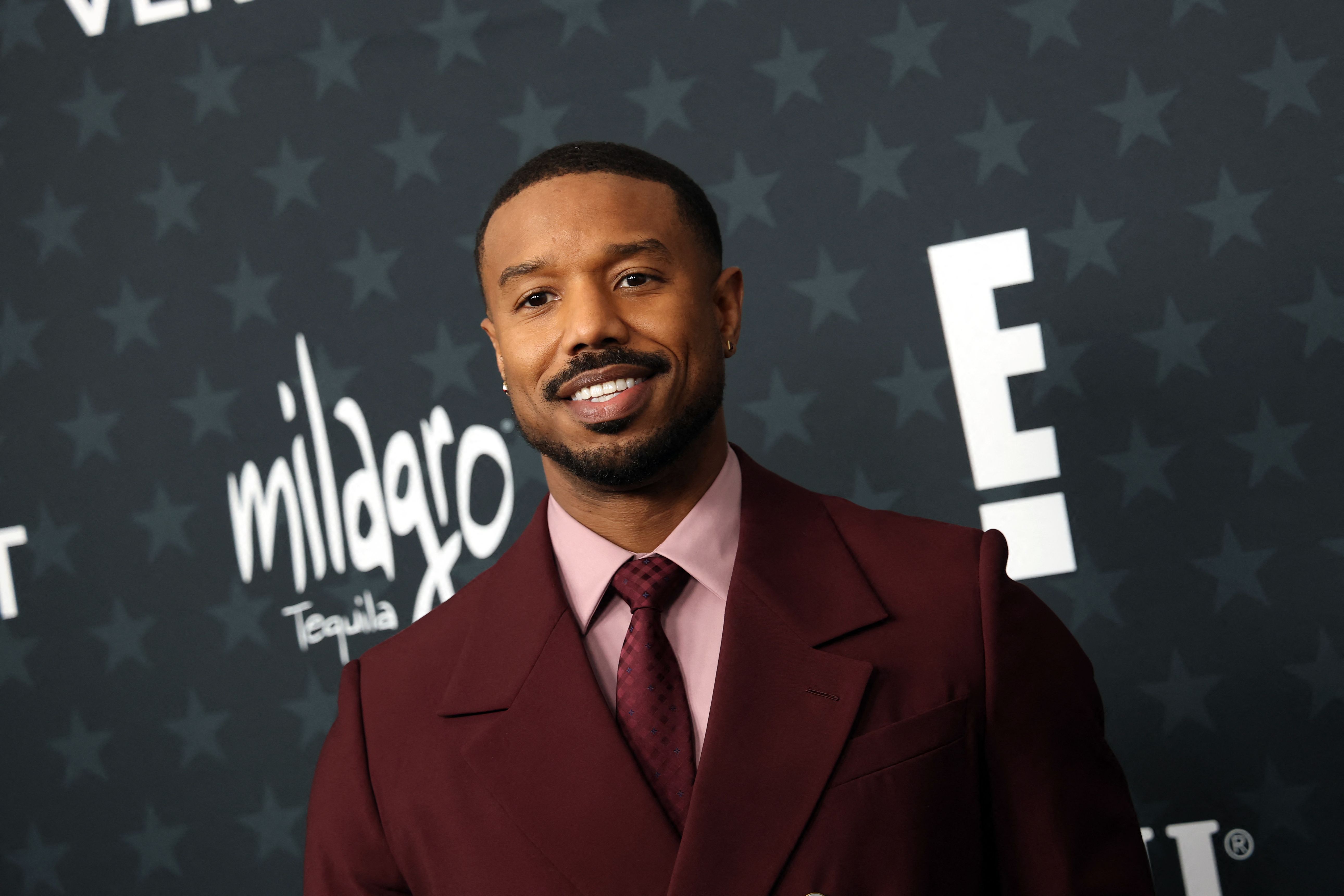(FILES) US actor Michael B. Jordan attends the 31st Annual Critics Choice Awards at Barker Hangar in Santa Monica, California, on January 4, 2026. Warner Bros may be for sale, but the studio's acclaimed hits Sinners and One Battle After Another are expected to dominate the Oscar nominations when the Academy announces its final contenders January 22, 2026. (Photo by Michael Tran / AFP)
