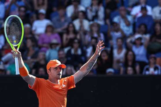 Spain's Alejandro Davidovich Fokina celebrates after winning against USAs Reilly Opelka during their men's singles match on day four of the Australian Open tennis tournament in Melbourne on January 21, 2026. (Photo by Izhar Khan / AFP) / -- IMAGE RESTRICTED TO EDITORIAL USE - STRICTLY NO COMMERCIAL USE --