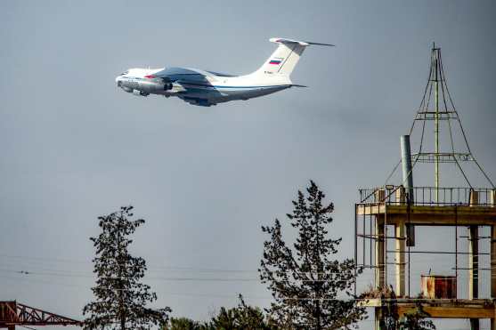 A Russian military Ilyushin Il-76 strategic airlift aircraft takes off from Qamishli International Airport in northeastern Syria's Hasakah province on January 27, 2026. (Photo by Delil SOULEIMAN / AFP)