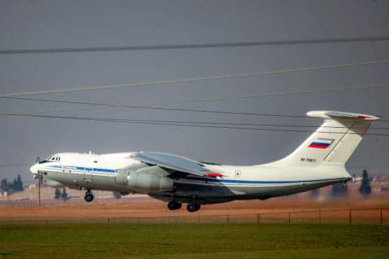 A Russian military Ilyushin Il-76 strategic airlift aircraft takes off from Qamishli International Airport in northeastern Syria's Hasakah province on January 27, 2026. (Photo by Delil SOULEIMAN / AFP)