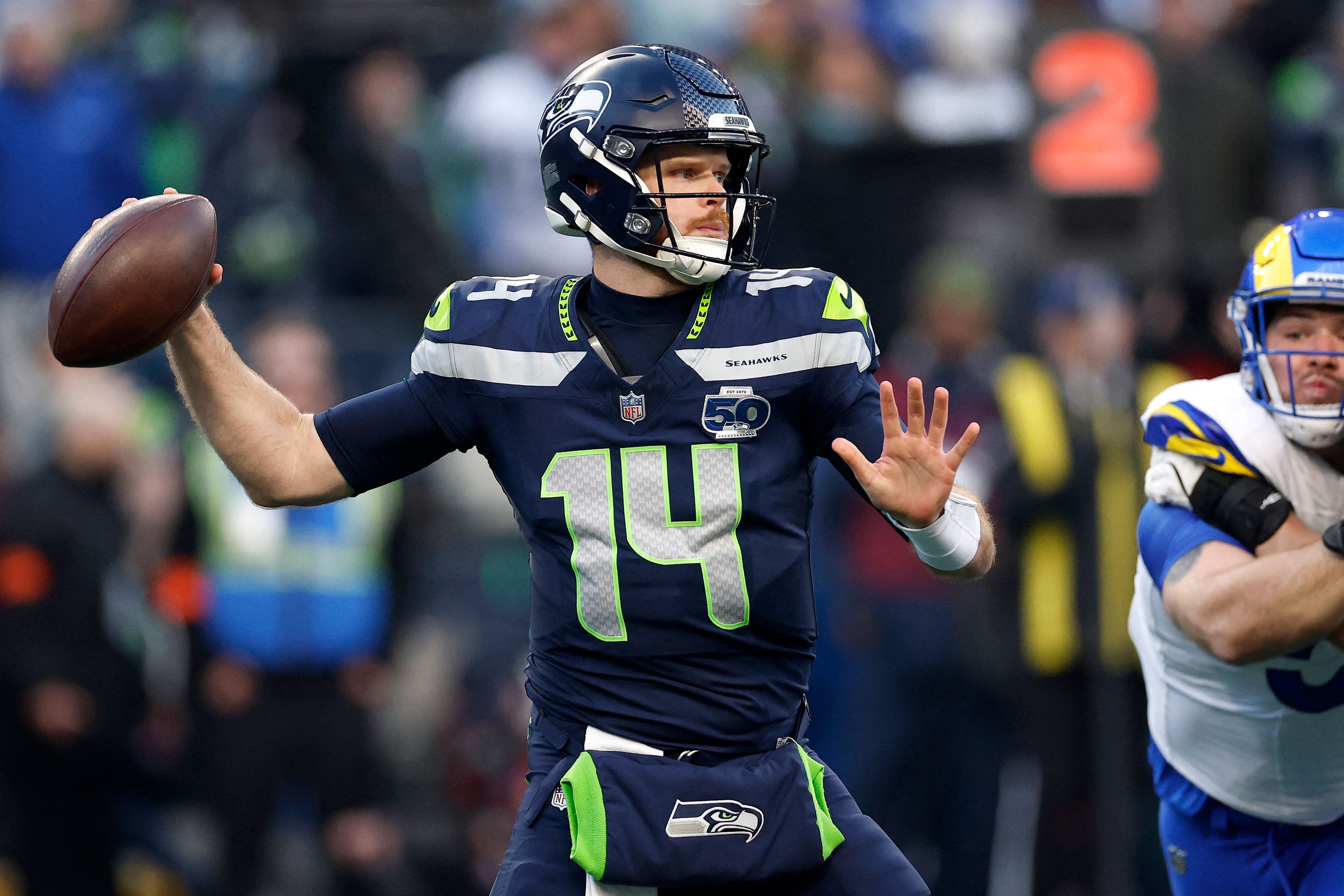 SEATTLE, WASHINGTON - JANUARY 25: Sam Darnold #14 of the Seattle Seahawks throws a pass during the first quarter against the Los Angeles Rams in the NFC Championship game at Lumen Field on January 25, 2026 in Seattle, Washington.   Ronald Martinez/Getty Images/AFP (Photo by RONALD MARTINEZ / GETTY IMAGES NORTH AMERICA / Getty Images via AFP)