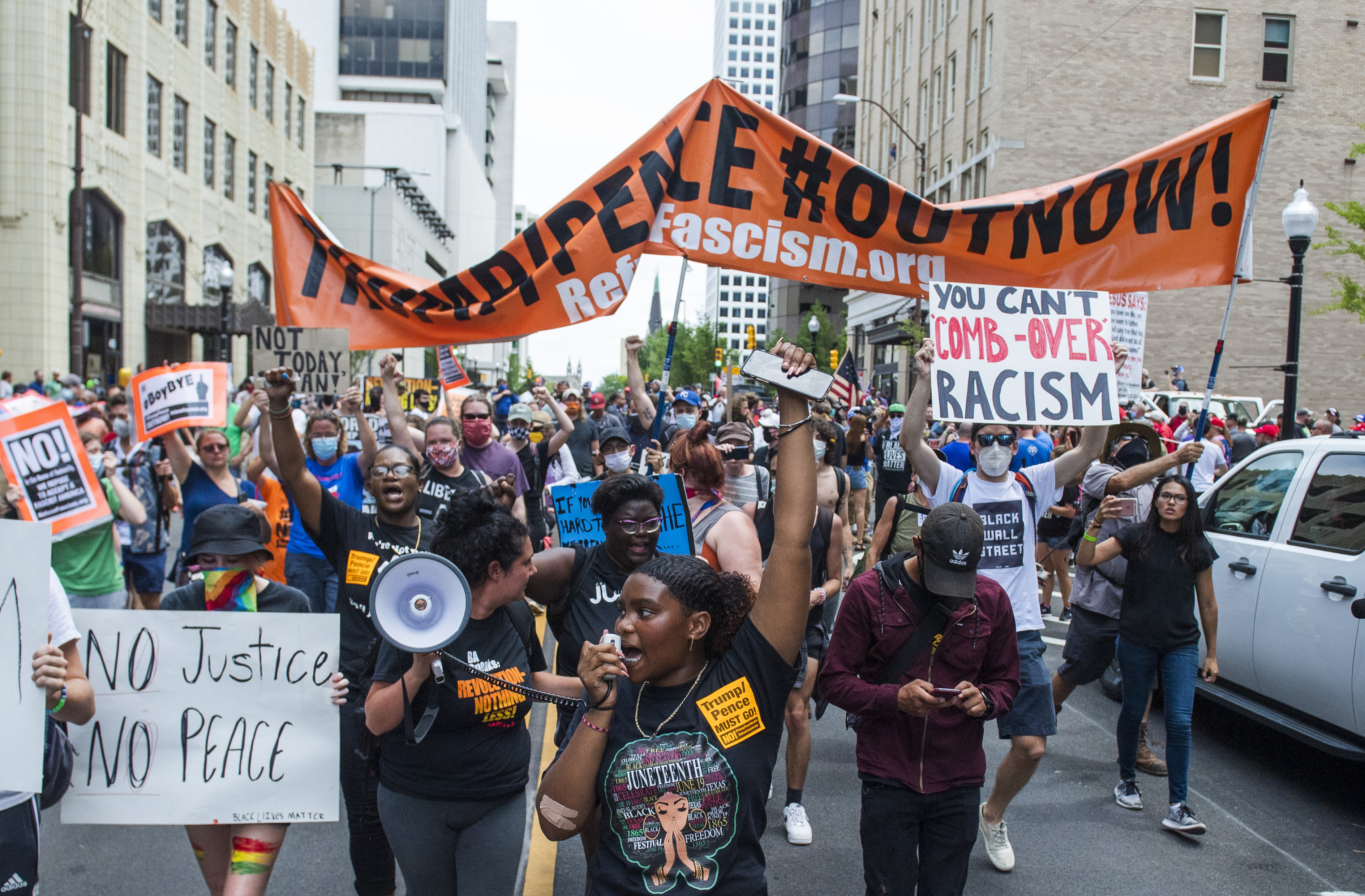 People in Tulsa protest President Donald Trump in June 2020. He was in the city to hold a rally. MUST CREDIT: Amanda Voisard/For The Washington Post