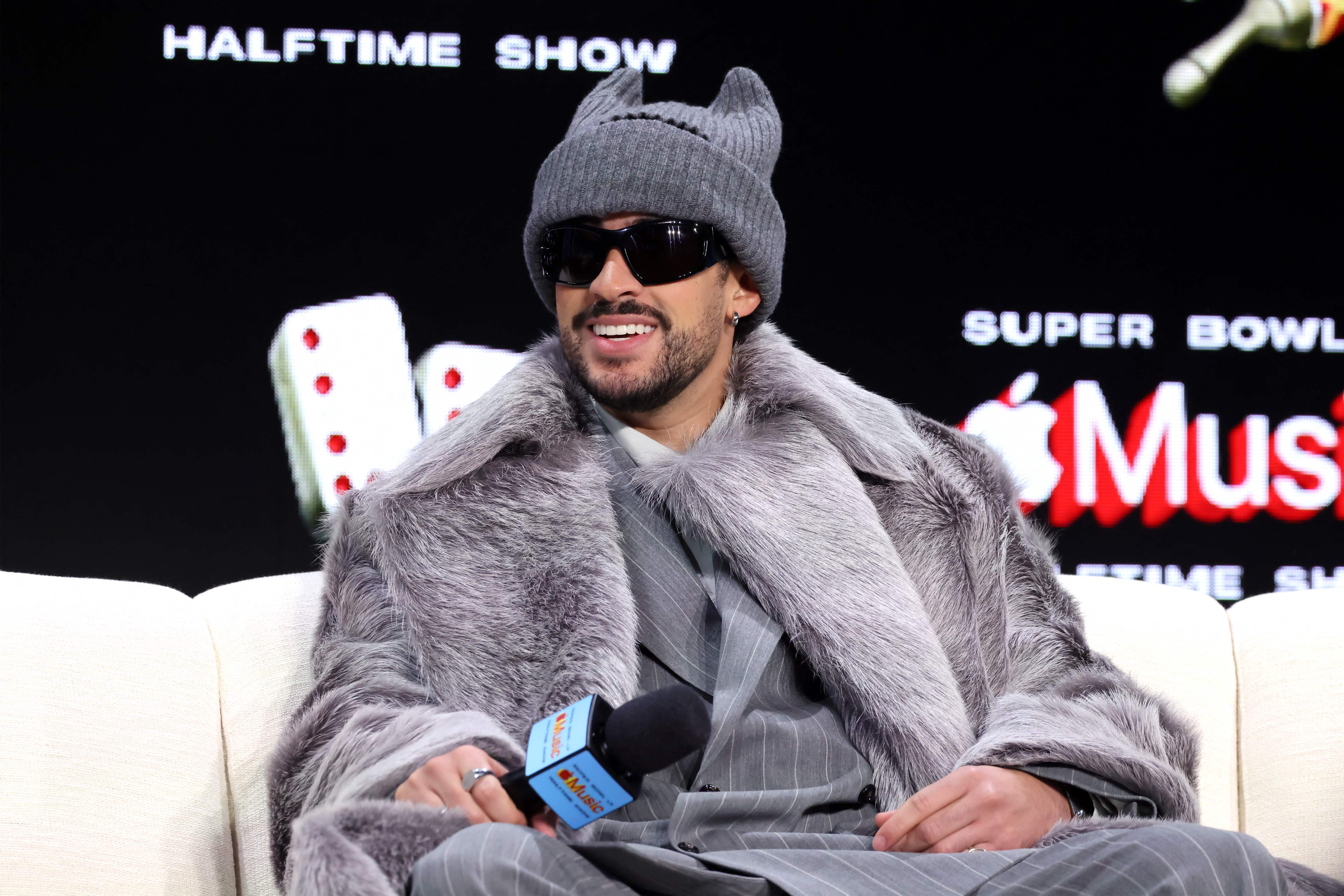 SAN FRANCISCO, CALIFORNIA - FEBRUARY 05: Bad Bunny speaks onstage during the Super Bowl LX Pregame & Apple Music Super Bowl LX Halftime Show Press Conference at Moscone Center West on February 05, 2026 in San Francisco, California.   Mike Coppola/Getty Images/AFP (Photo by Mike Coppola / GETTY IMAGES NORTH AMERICA / Getty Images via AFP)