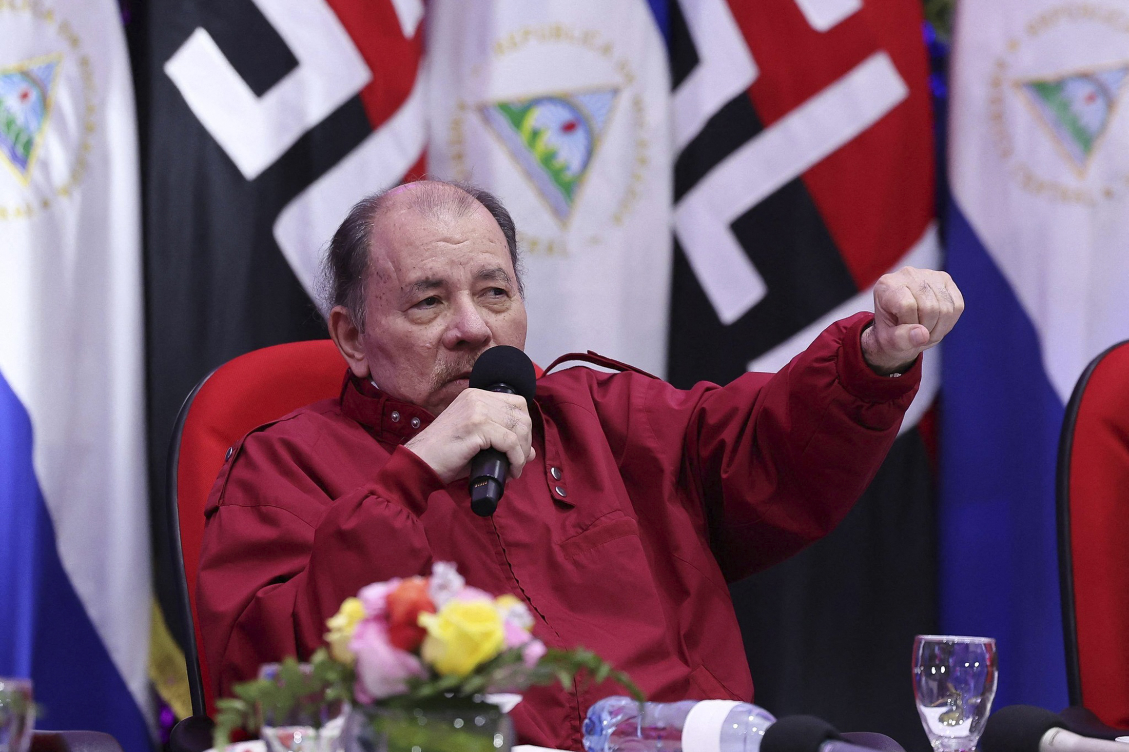 This handout picture released by the official El 19 Digital news outlet shows Nicaragua's President Daniel Ortega speaking during the central ceremony marking the 92nd anniversary of the death of Augusto C. Sandino, regarded as a national hero, in Managua on February 23, 2026. (Photo by JAIRO CAJINA / El 19 DIGITAL / AFP) / RESTRICTED TO EDITORIAL USE - MANDATORY CREDIT "AFP PHOTO / EL 19 DIGITAL / JAIRO CAJINA" - NO MARKETING NO ADVERTISING CAMPAIGNS - DISTRIBUTED AS A SERVICE TO CLIENTS