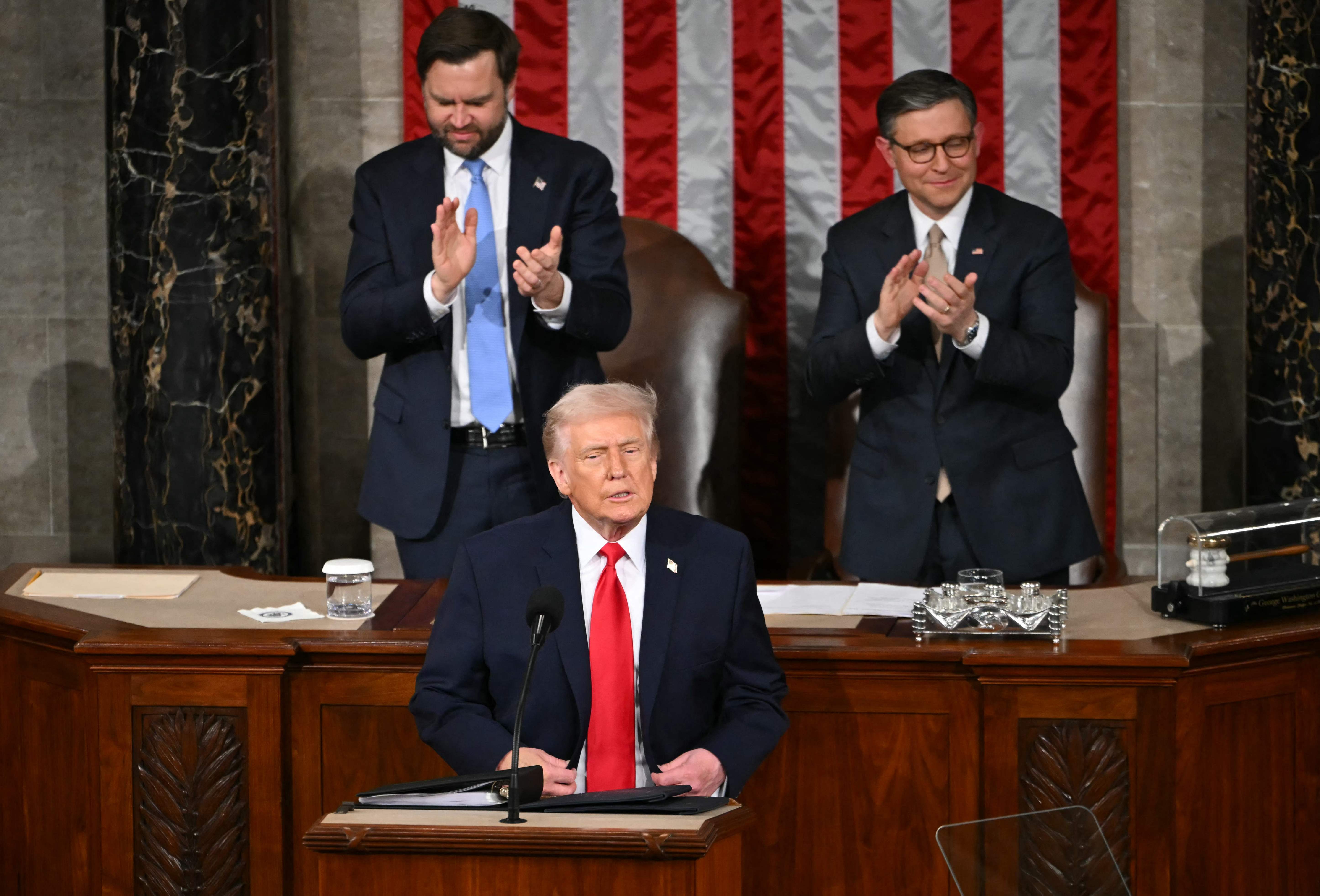 US President Donald Trump concludes his remarks during the State of the Union address in the House Chamber of the US Capitol in Washington, DC, on February 24, 2026. (Photo by ANDREW CABALLERO-REYNOLDS / AFP)