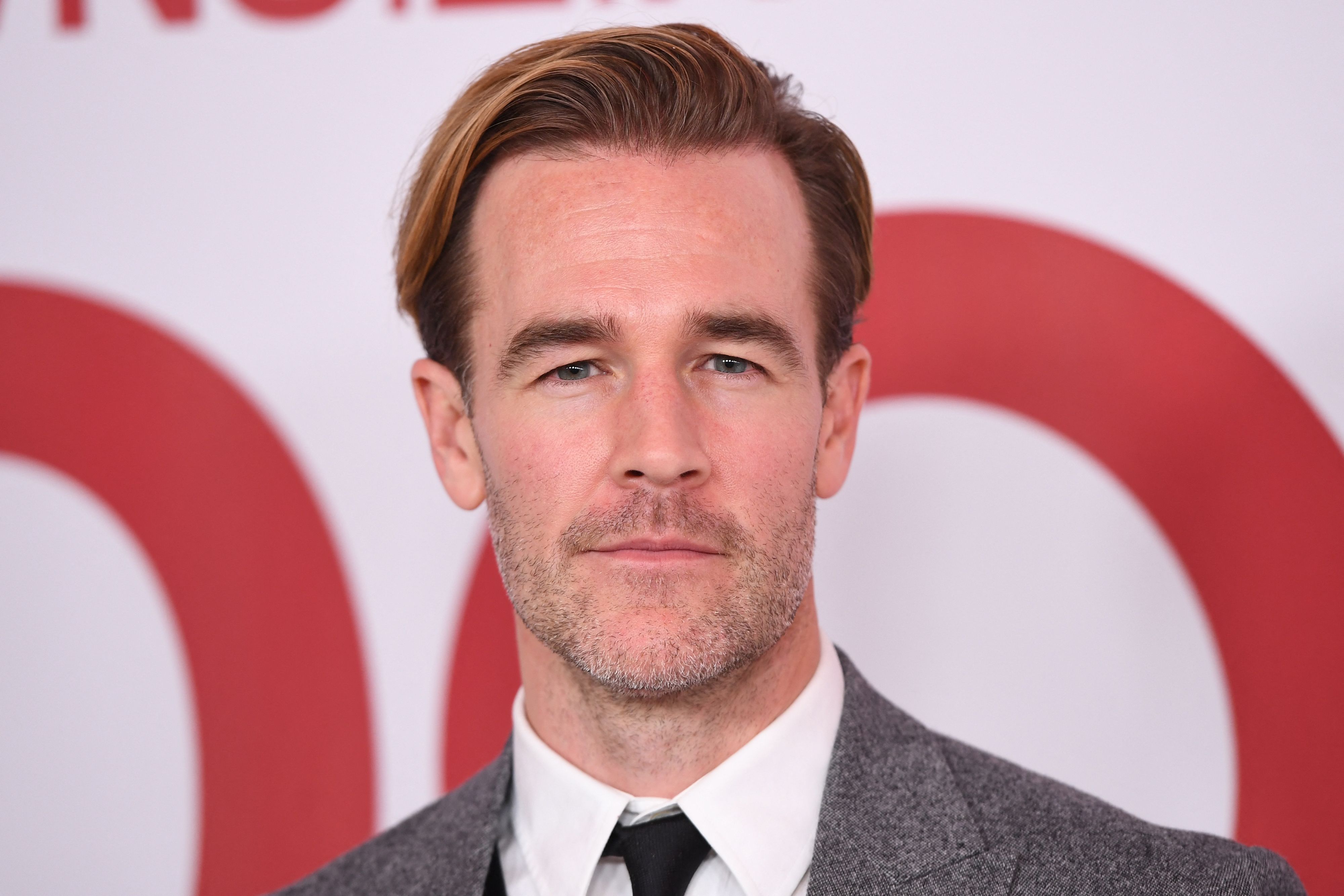 (FILES) Actor James Van Der Beek arrives for a special screening of 'Downsizing' on December 18, 2017 at the Regency Village Theatre in Los Angeles, California. US actor James Van Der Beek, the star of the American TV series "Dawson's Creek," died on February 11 at age 48 after a battle with colorectal cancer. "Our beloved James David Van Der Beek passed peacefully this morning. He met his final days with courage, faith, and grace," read a post on his Instagram page. Van Der Beek, who was married and had six children, announced his cancer diagnosis in 2024. (Photo by Robyn Beck / AFP)