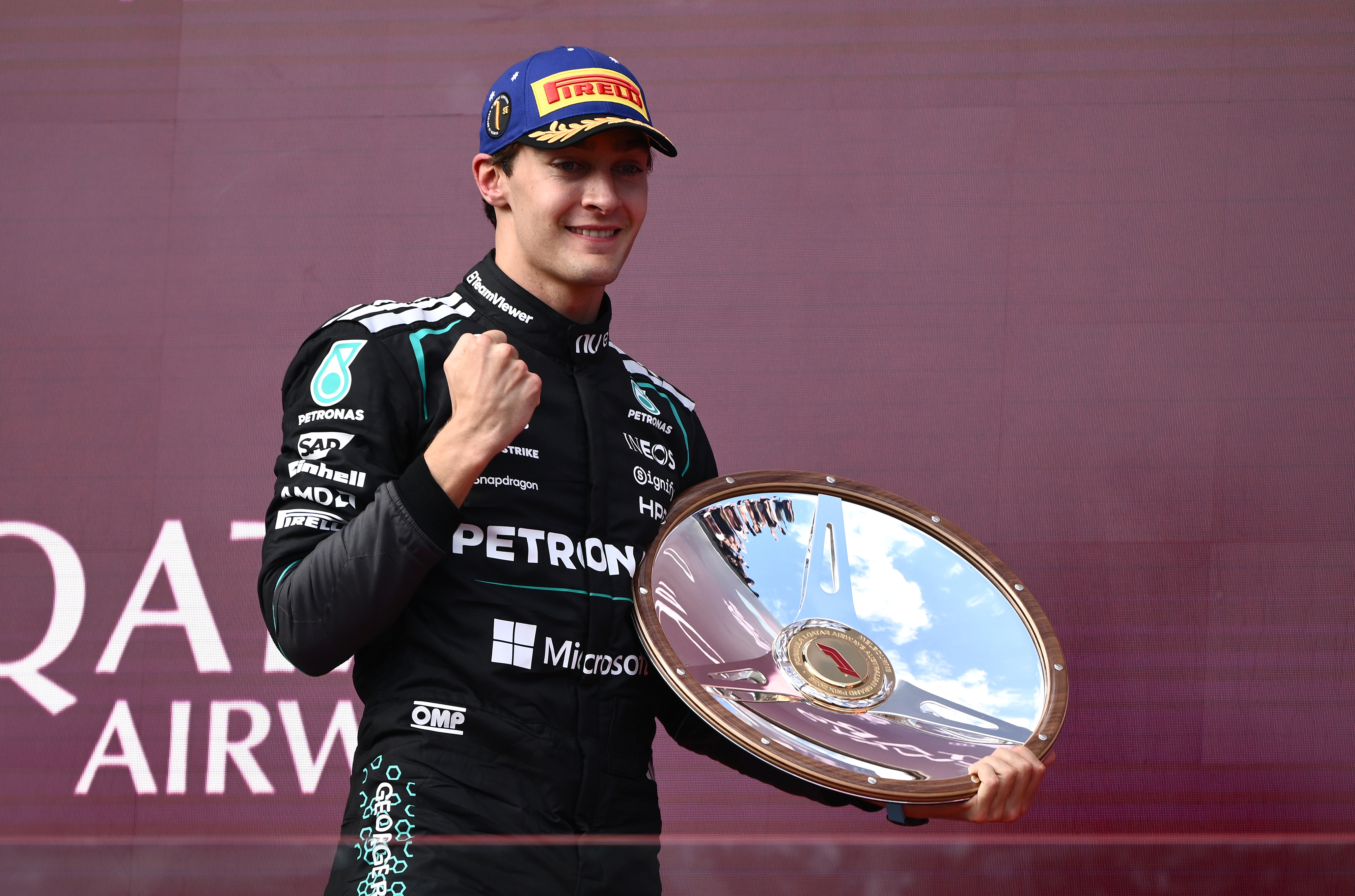 MELBOURNE (Australia), 08/03/2026.- Mercedes-AMG PETRONAS Formula One Team driver George Russell celebrates on the podium after winning the 2026 Australian Grand Prix at Albert Park Circuit in Melbourne, Australia, 08 March 2026. (Fórmula Uno) EFE/EPA/JOEL CARRETT EDITORIAL USE ONLY AUSTRALIA AND NEW ZEALAND OUT