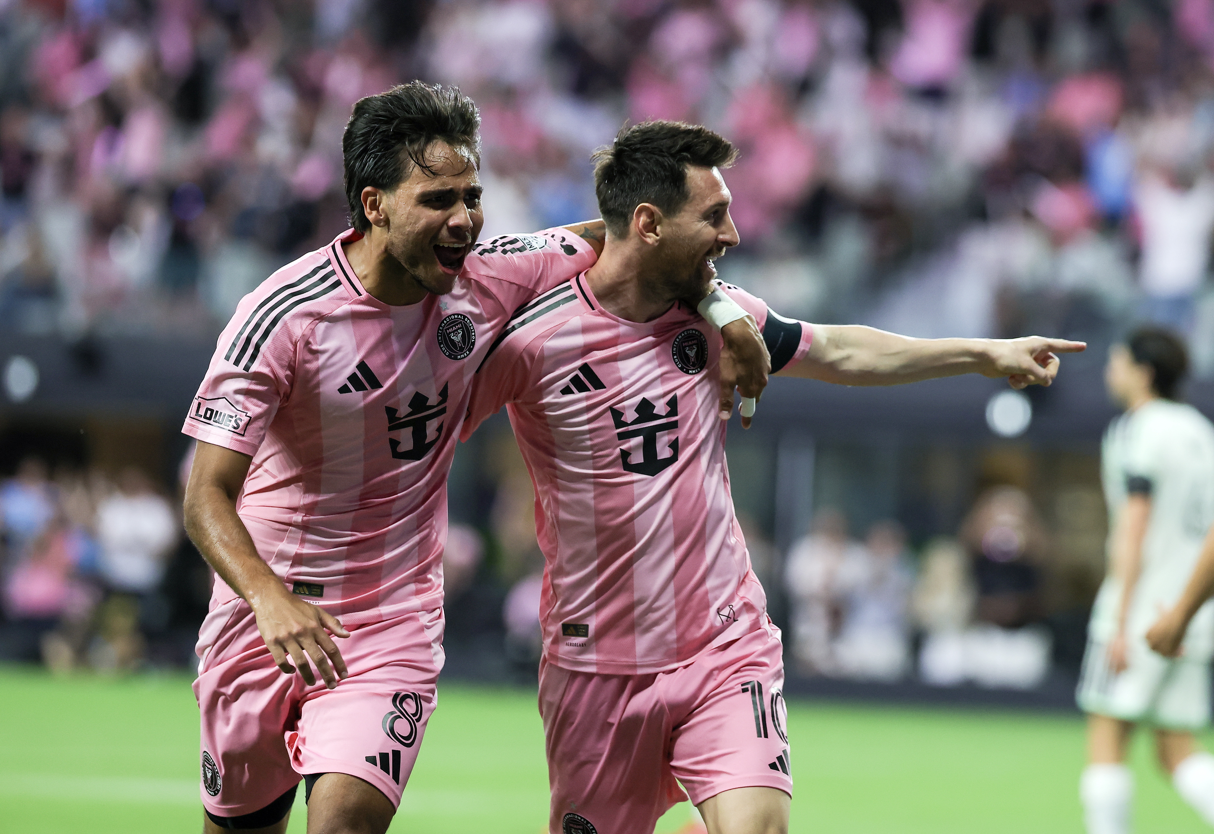 MIAMI (United States), 04/04/2026.- Inter Miami CF forward Lionel Messi (R) and Inter Miami CF midfielder Telasco Segovia (L) celebrate a goal during the MLS soccer game between Inter Miami CF and Austin FC game at the Nu Stadium in Miami, Florida, USA, 04 April 2026. EFE/EPA/CRISTOBAL HERRERA-ULASHKEVICH