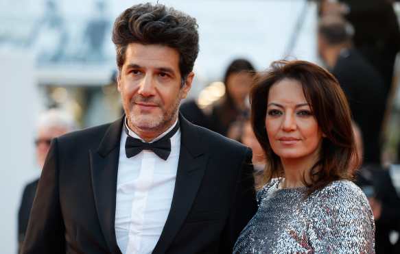 CANNES (France), 14/05/2026.- Nabil Ayouch (L) and Maryam Touzani arrive for the premiere of 'Parallel Tales' (Histoires Parallele) during the 79th annual Cannes Film Festival, in Cannes, France, 14 May 2026. The film festival runs from 12 to 23 May 2026. (Cine, Francia) EFE/EPA/SEBASTIEN NOGIER