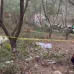 Autoridades resguardan la escena donde fueron localizados cuatro cadáveres encostalados en una zona boscosa de San Miguel Dueñas, Sacatepéquez. Imagen ilustrativa.(Foto: Hemeroteca PL)