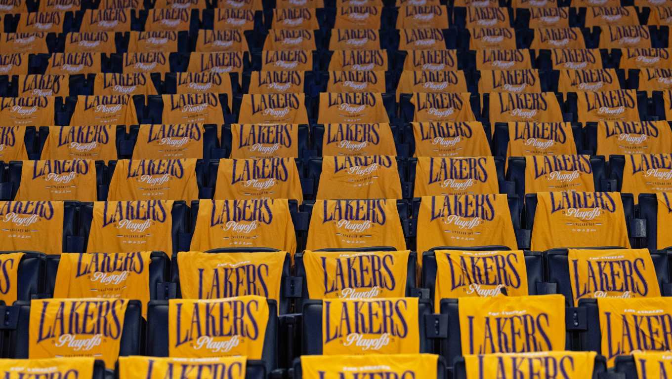 Los Angeles (United States), 12/08/2026.- (FILE) - T-shirts are laid out on the back of the seats before the start of the NBA playoffs round one game one between the Minnesota Timberwolves and the Los Angeles Lakers in Los Angeles, California, 19 April 2025 (re-issued 12 August 2026). The LA Lakers are to be sold to former Disney CEO Bob Iger and venture capitalist Josh Kushner, both confirmed in a joint statement on 12 August 2026. The record-breaking 12.5 billion US dollar deal is pending the NBA Board of Governor's approval. (Baloncesto) EFE/EPA/ALLISON DINNER SHUTTERSTOCK OUT