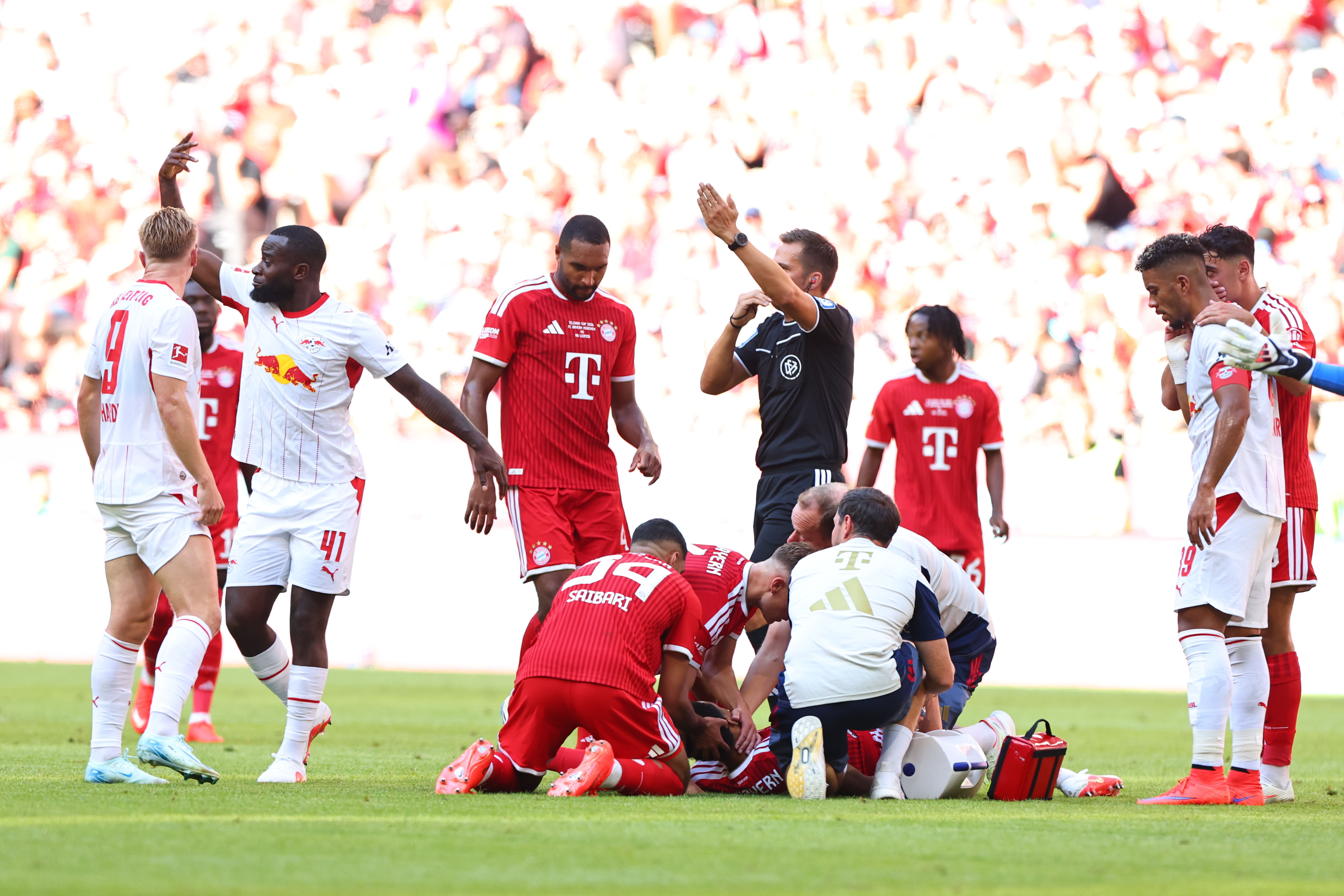 MUNICH (Germany), 15/08/2026.- Jamal Musiala of Munich gets medical treatment during the Telekom Cup between Bayern Munich and RB Leipzig in Munich Germany, 15 August 2026. (Alemania) EFE/EPA/ANNA SZILAGYI CONDITIONS - ATTENTION: The DFB regulations prohibit any use of photographs as image sequences and/or quasi-video.