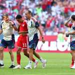 MUNICH (Germany), 15/08/2026.- Jamal Musiala of Munich leaves the pitch injured the Telekom Cup between Bayern Munich and RB Leipzig in Munich Germany, 15 August 2026. (Alemania) EFE/EPA/ANNA SZILAGYI CONDITIONS - ATTENTION: The DFB regulations prohibit any use of photographs as image sequences and/or quasi-video.
