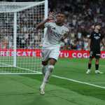 MADRID, 26/08/2026.- El delantero francés del Real Madrid Kylian Mbappé celebra su tercer gol durante el encuentro correspondiente a la primera jornada de LaLiga que Real Madrid y Real Sociedad disputan este miércoles en el Santiago Bernabéu, en Madrid. EFE/ Kiko Huesca