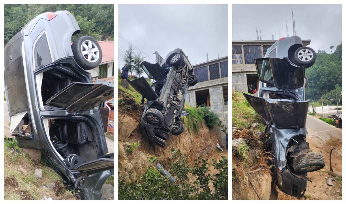 Una camioneta queda suspendida en un barranco luego de caer en el km 101.9 de la ruta Interamericana, en Chichicastenango, Quiché. (Foto Prensa Libre: CVB)