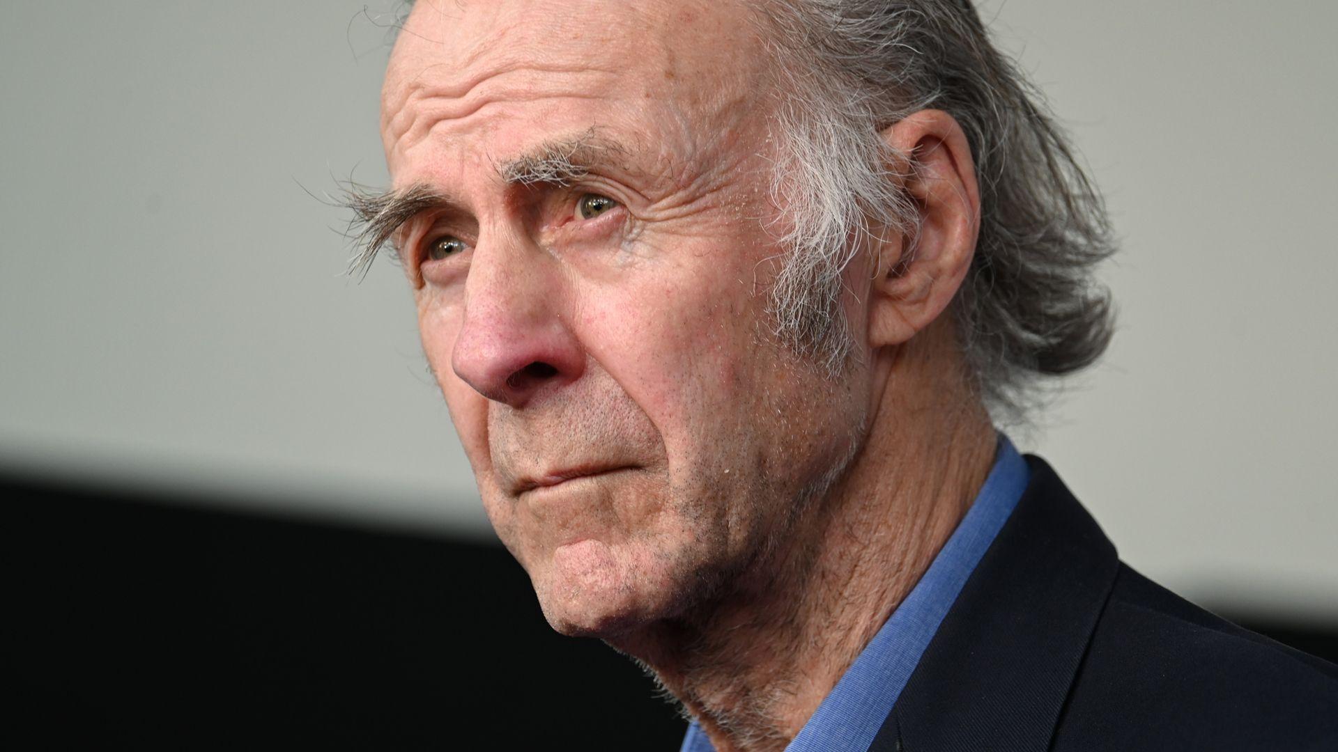 Sir Ranulph Fiennes in a blue shirt and blazer as he attends a premiere