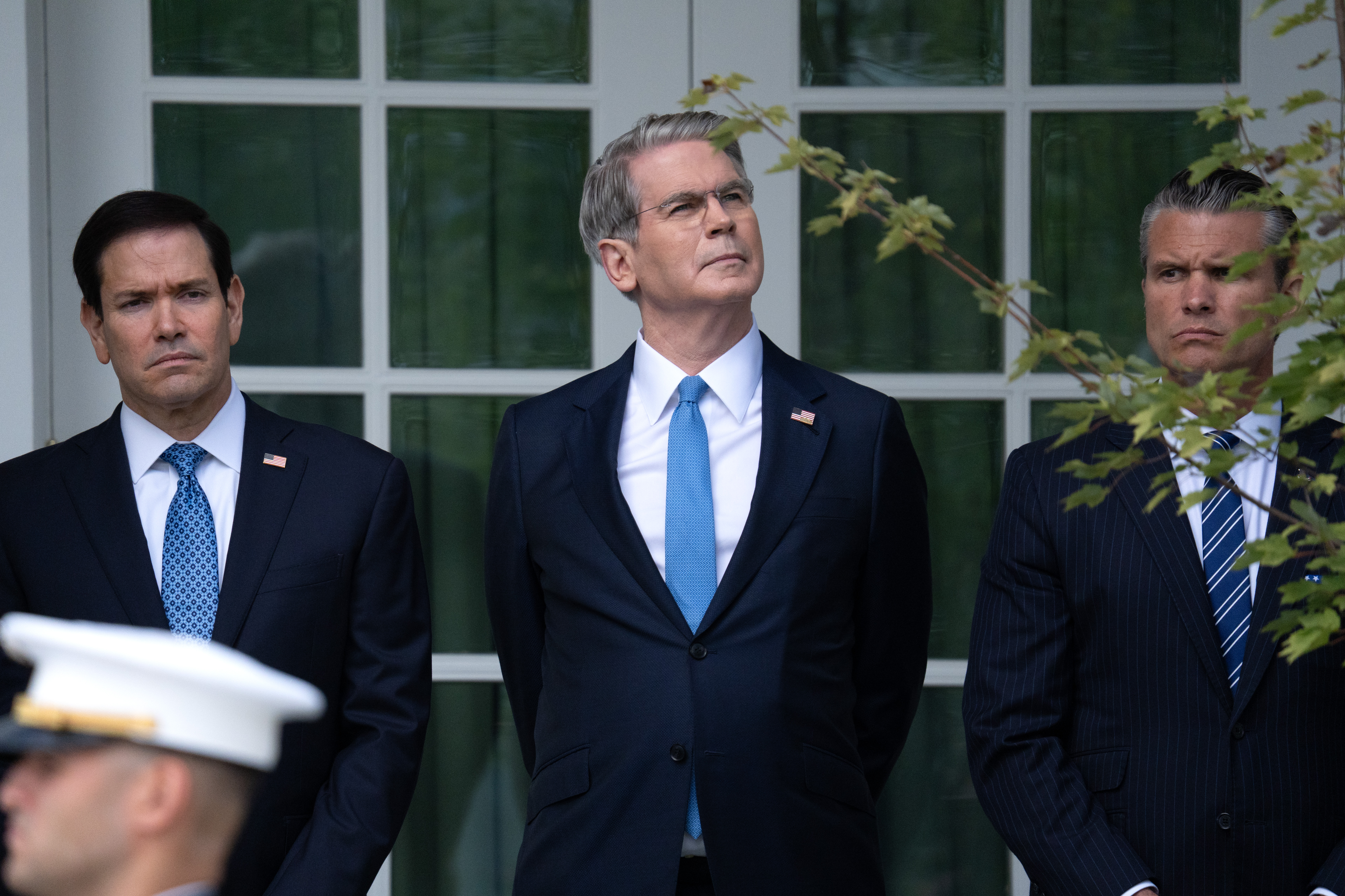 From left, Secretary of State Marco Rubio, Treasury Secretary Scott Bessent and Defense Secretary Pete Hegseth attend a military review at the White House last month. (Peter W. Stevenson/The Washington Post)